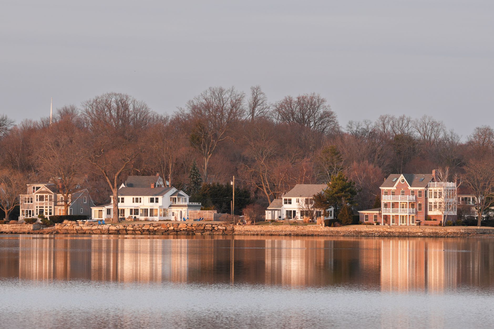 Luxury Sotheby’s Homes exterior with modern architecture and elegant landscaping.